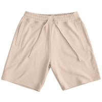 Plant dyed organic shorts in sand.